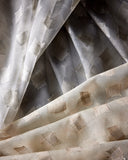 Elegant Dynamic Duo Sand Embroidered Sheer Drapery Fabric by Donghia